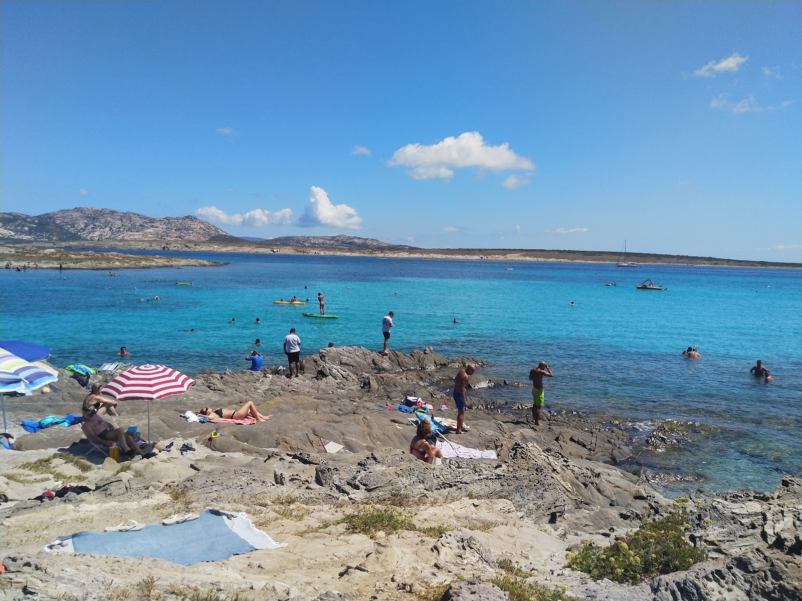 Foto van Pelosetta Strand met turquoise puur water oppervlakte