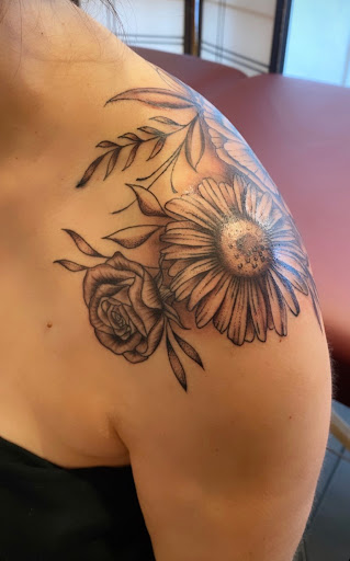 Explore uplifting tattoo ideas, creative tattoo ideas in Boulder, available at Claw and Talon Tattoo