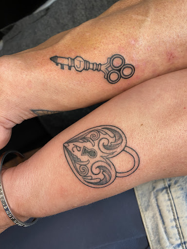 Explore ideas for ring tattoos, creative tattoo ideas in Red Bank, available at Resilient Visions