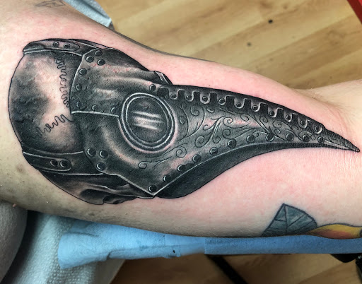 Explore women's wrist tattoo ideas, creative tattoo ideas in Kenosha, available at Kenosha Tattoo Company