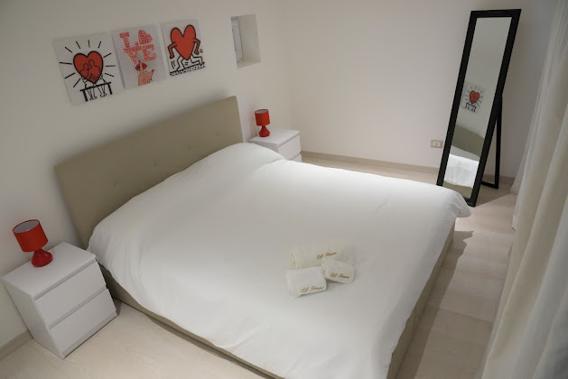 Photo Casa vacanza Loft Romano 96100 Syracuse