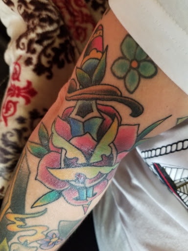 Explore rattlesnake tattoo ideas, creative tattoo ideas in Powell, available at Hummingbird Tattoo Studio