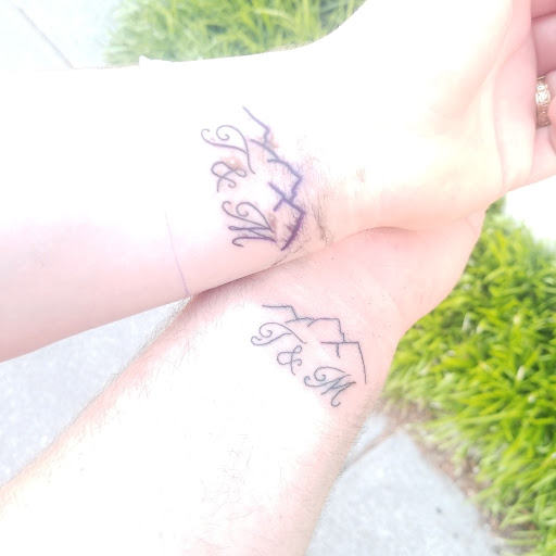 Explore red tattoo ideas women, creative tattoo ideas in Pigeon Forge, available at Black Orchid Tattoo Studio