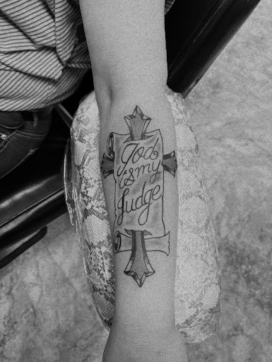 Explore fishing tattoo ideas for females, creative tattoo ideas in Seymour, available at American Gypsy Tattoo Corp.