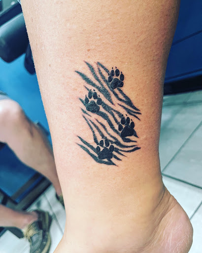 Explore smile now cry later tattoo ideas, creative tattoo ideas in Foley, available at Symbolic Ink Tattoo Studio