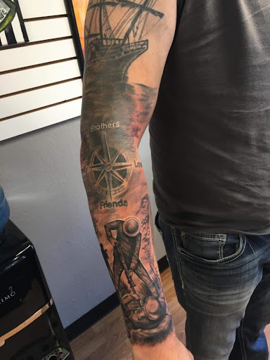 Explore tattoo ideas of lions, creative tattoo ideas in Hudson, available at Twisted Canvas Tattoo and Art Studio