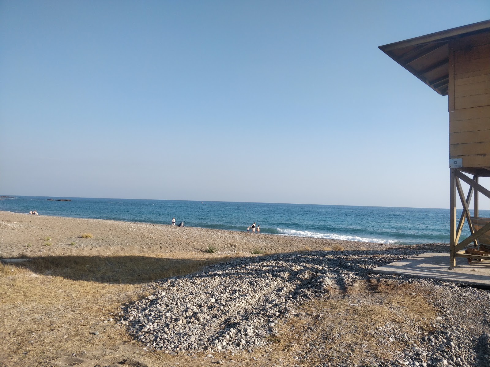 Valokuva Mandria beachista. puhtaustasolla keskipitkä