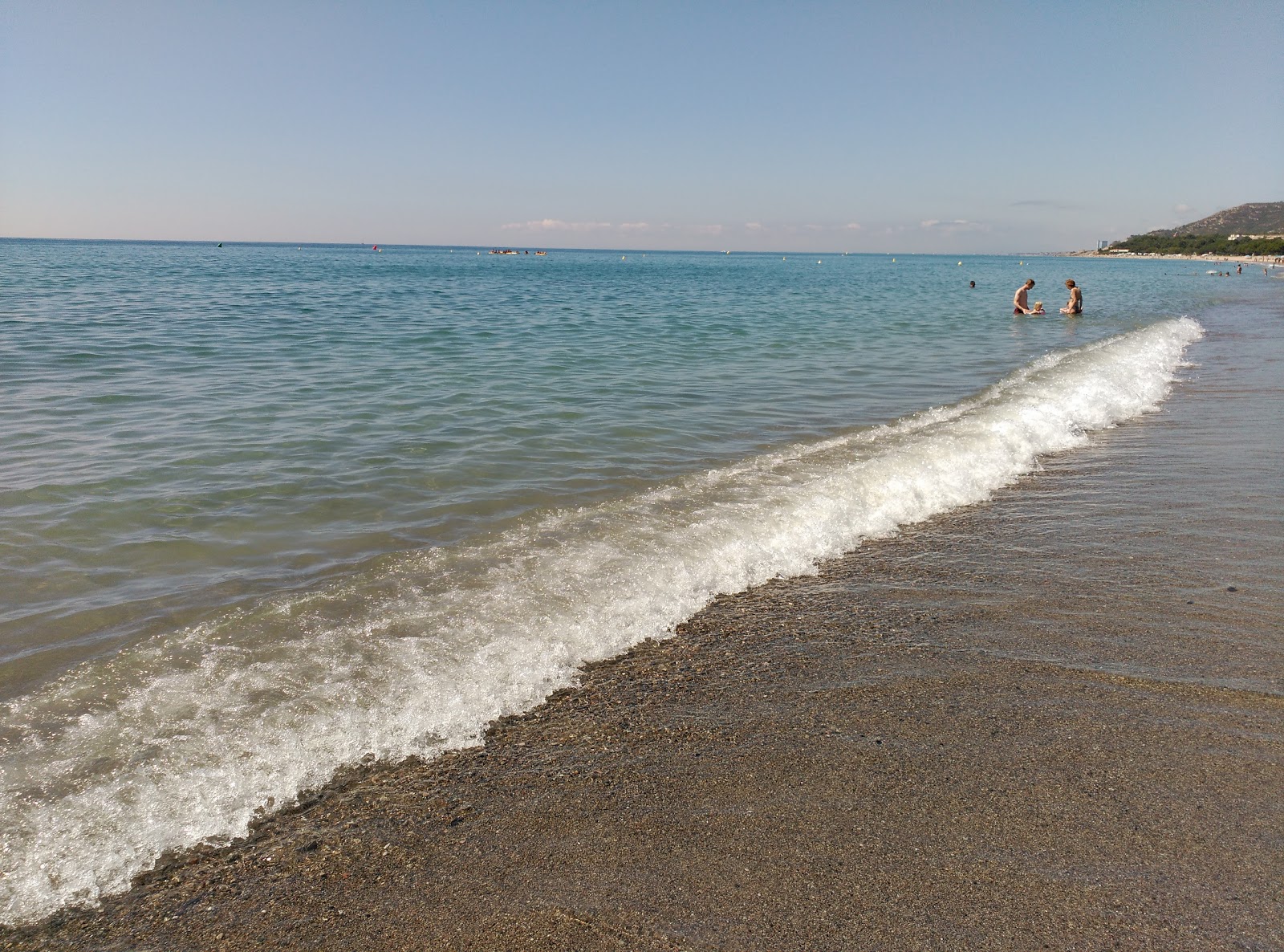 Photo of L'Hospitalet beach with long bay