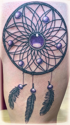 Find tattoo ideas with roses for your next unique tattoo in La Crosse at La Crosse Tattoo