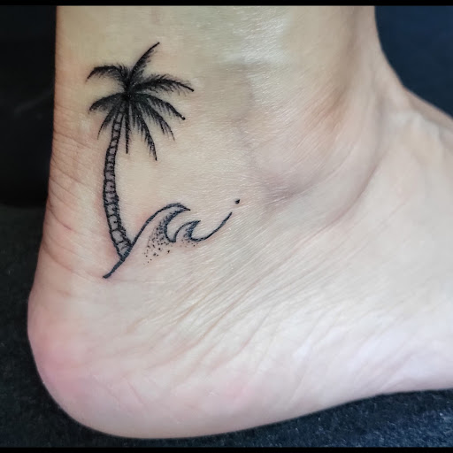 Explore paper airplane tattoo ideas, creative tattoo ideas in Coachella, available at Ink Devotion Tattoo & Body Piercings