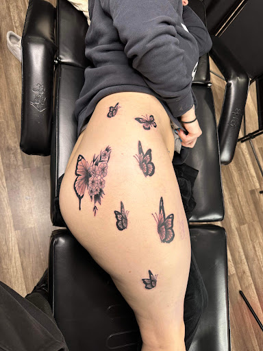 Explore tattoo name ideas for men, creative tattoo ideas in Sayville, available at Dark Timez Tattoo and Piercing