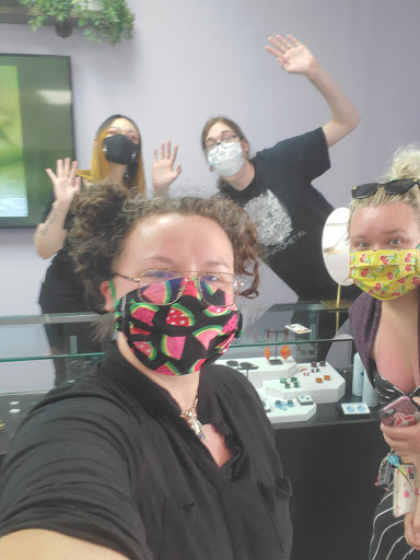 Explore tramp stamp tattoo cover up ideas, creative tattoo ideas in Akron, available at Lucid Body Piercing