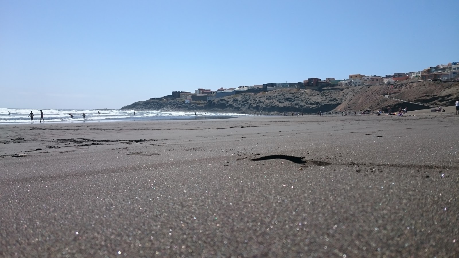 Photo of Playa del Hombre and the settlement