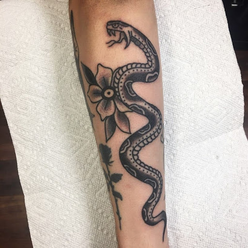 Explore popeye tattoo ideas, creative tattoo ideas in Reno, available at Evolution Tattoo