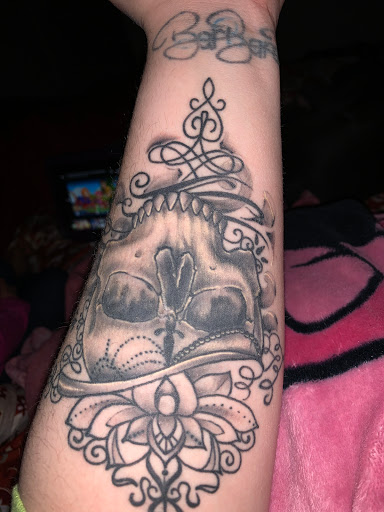 Explore long thin tattoo ideas, creative tattoo ideas in Anchorage, available at Body Piercing Unlimited