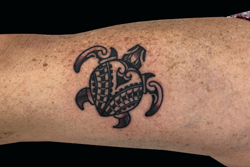 Explore pin up girl tattoo ideas, creative tattoo ideas in Lahaina, available at Sweet Trade Tattoo