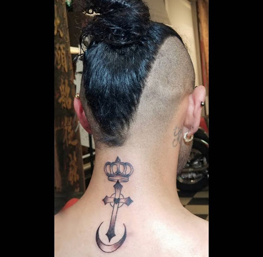 Explore prison tattoo ideas, creative tattoo ideas in Kansas City, available at Grimm Tattoo and Bert Grimm Museum