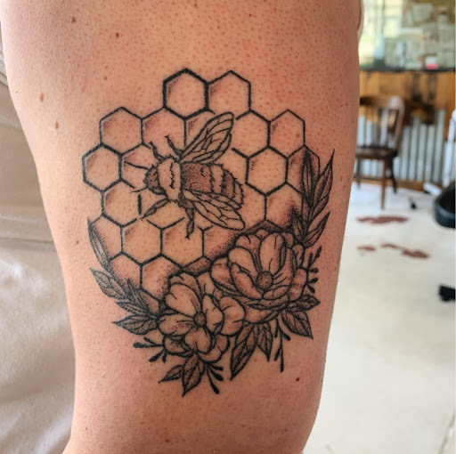 Explore chest tattoo lettering ideas, creative tattoo ideas in Lufkin, available at Black Spot Tattoo Company