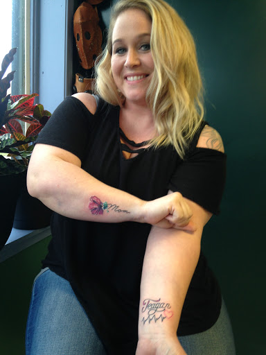 Explore mom & son tattoo ideas, creative tattoo ideas in Kent, available at War Horse Ink
