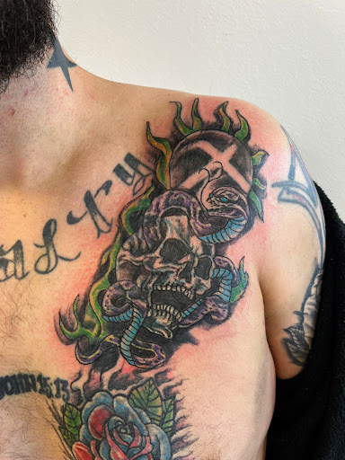 Explore small frog tattoo ideas, creative tattoo ideas in Seymour, available at American Gypsy Tattoo Corp.