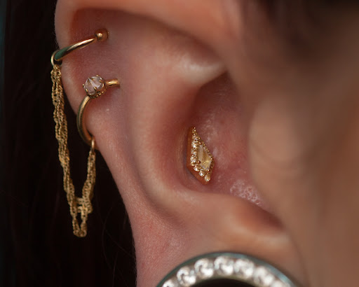 Explore bikini tattoo ideas, creative tattoo ideas in Boston, available at Arcadia Body Piercing
