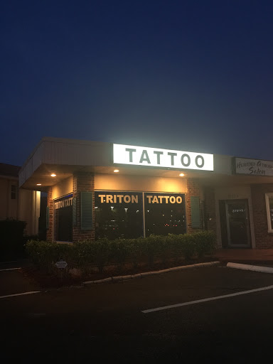 Explore cat paw tattoo ideas, creative tattoo ideas in North Palm Beach, available at Triton Tattoo North Palm Beach