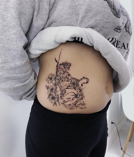 Explore knee surgery tattoo ideas, creative tattoo ideas in Orange, available at Baron Art Tattoo