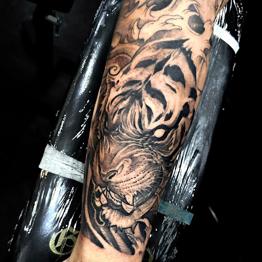 Explore caterpillar tattoo ideas, creative tattoo ideas in Saint Paul, available at Supreme Art Of War Inc