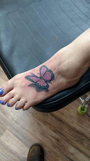 Explore guitarist tattoo ideas, creative tattoo ideas in Austin, available at Ivys Ink Tattoo