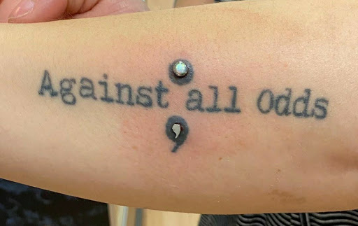 Explore tattoo ideas for neck, creative tattoo ideas in Summerville, available at Exotic Impressions Body Piercing