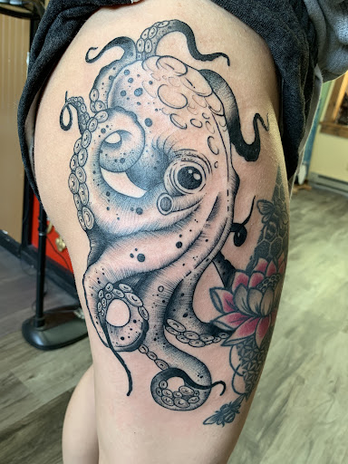 Explore wrist cross tattoo ideas, creative tattoo ideas in Duluth, available at Duluth Tattoo Company