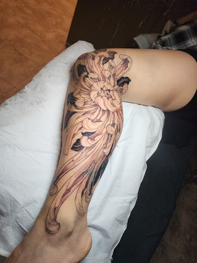 Explore tattoo ideas lion, creative tattoo ideas in Tea, available at Red Arbor Tattoo