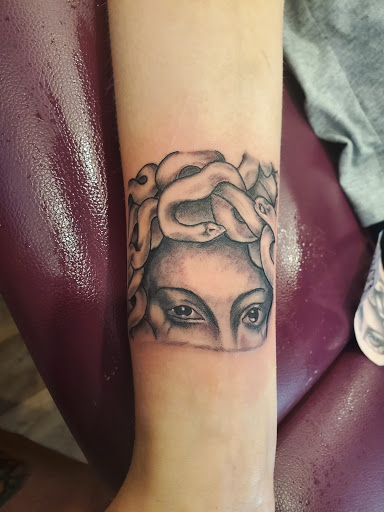 Explore traditional elbow tattoo ideas, creative tattoo ideas in Endicott, available at INK THERAPY - WE ARE NOT CLOSED