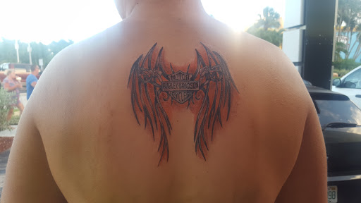 Explore women's tattoo placement ideas, creative tattoo ideas in Cocoa Beach, available at The Corner Tattoo and Piercing Studio