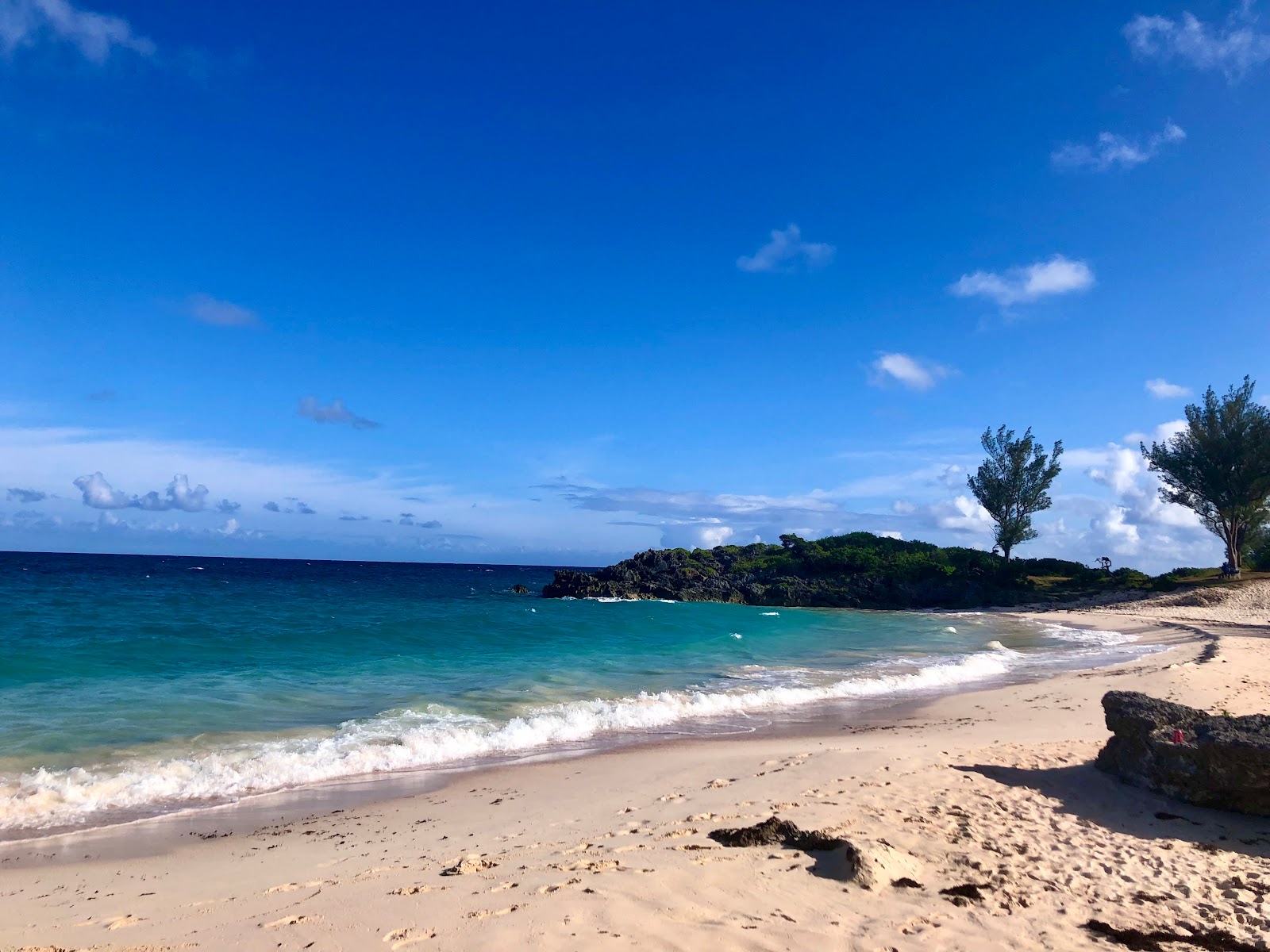 Photo of John Smith's Bay Beach and the settlement