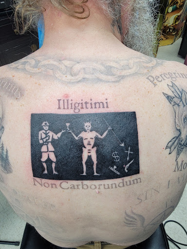 Explore dinosaur tattoo ideas, creative tattoo ideas in Pittsburgh, available at Crimson Lotus Collective