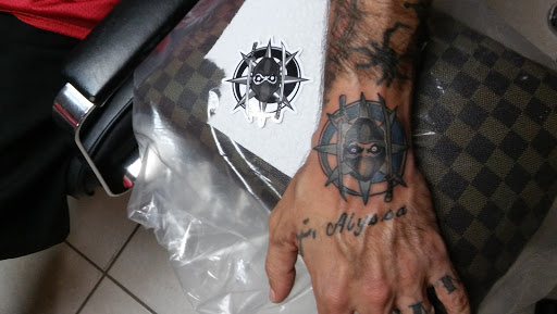 Tattoo Shop «Almighty Tattoo ( Under new ownership now Loyalty Tattoo Company!!!!)», reviews and photos, 5337 S Dort Hwy, Flint, MI 48507, USA