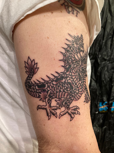 Find fake tattoos idea for your next unique tattoo in Omaha at Liquid Courage Tattoos
