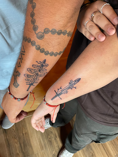 Explore shaka tattoo ideas, creative tattoo ideas in Houston, available at MS Studios Houstons Ink Therapy