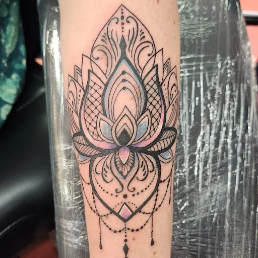 Explore women's leg sleeve tattoo ideas, creative tattoo ideas in Inverness, available at The Perfect Spot Tattoos
