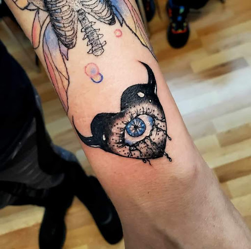 Explore cross tattoo ideas small, creative tattoo ideas in Benton, available at Spectrum Tattoo