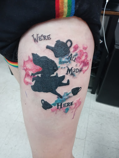 Find in between boob tattoo ideas for your next unique tattoo in Crystal City at Meraki Tattoo and Piercing