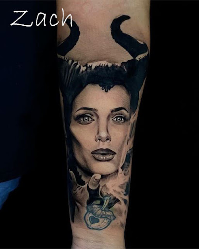 Explore feather tattoo ideas for men, creative tattoo ideas in Sanford, available at Venom Ink Tattoo