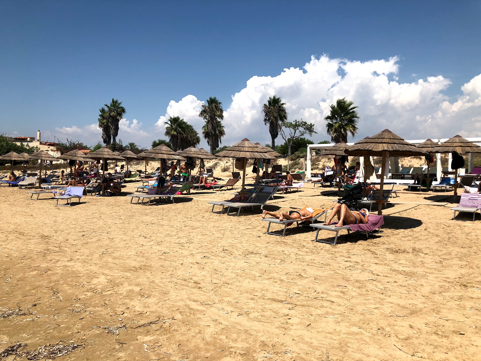 Porto Ulisse Beach'in fotoğrafı dağlarla çevrili