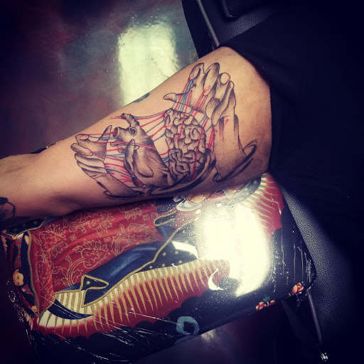 Find ideas for tattoo wedding rings for your next unique tattoo in Tucson at Jesses Tattoos & Tattoo Supplies