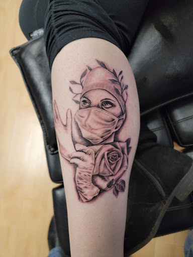 Explore cover up lower back tattoo ideas, creative tattoo ideas in Cambridge, available at Kappa Tattoo