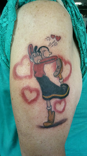 Explore flower spine tattoo ideas, creative tattoo ideas in Big Spring, available at A Mom & Pop Tattoo Shop