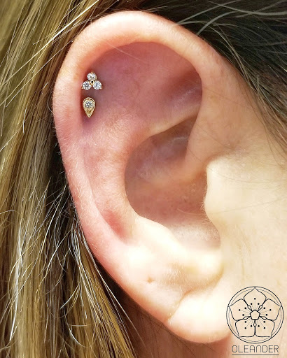 Explore side neck tattoo ideas, creative tattoo ideas in Worcester, available at Oleander Piercing