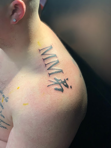 Explore lion sleeve tattoo ideas, creative tattoo ideas in Roscoe, available at Elevated Ink Tattoo