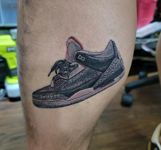 Explore cardinal tattoo ideas, creative tattoo ideas in East Northport, available at Tormented Souls